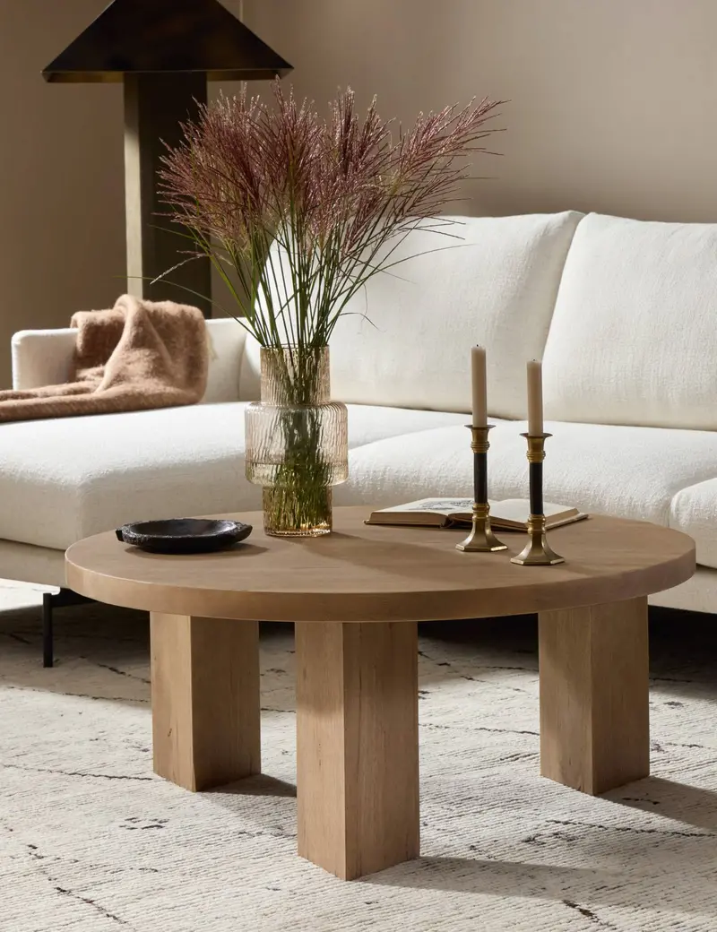 Placida Round Wood Coffee Table With Sculptural Base 1